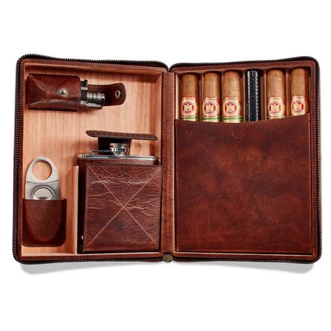 Initials or small phrases can be engraved with a laser. . Cigar travel case with flask